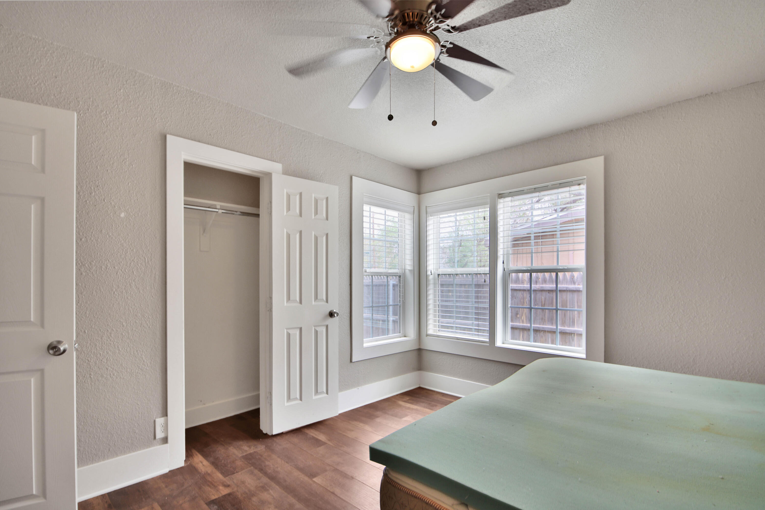 2408 24th Street Lubbock, TX 79411 - Photo 26 of 32 wooden floor in an empty room with a window