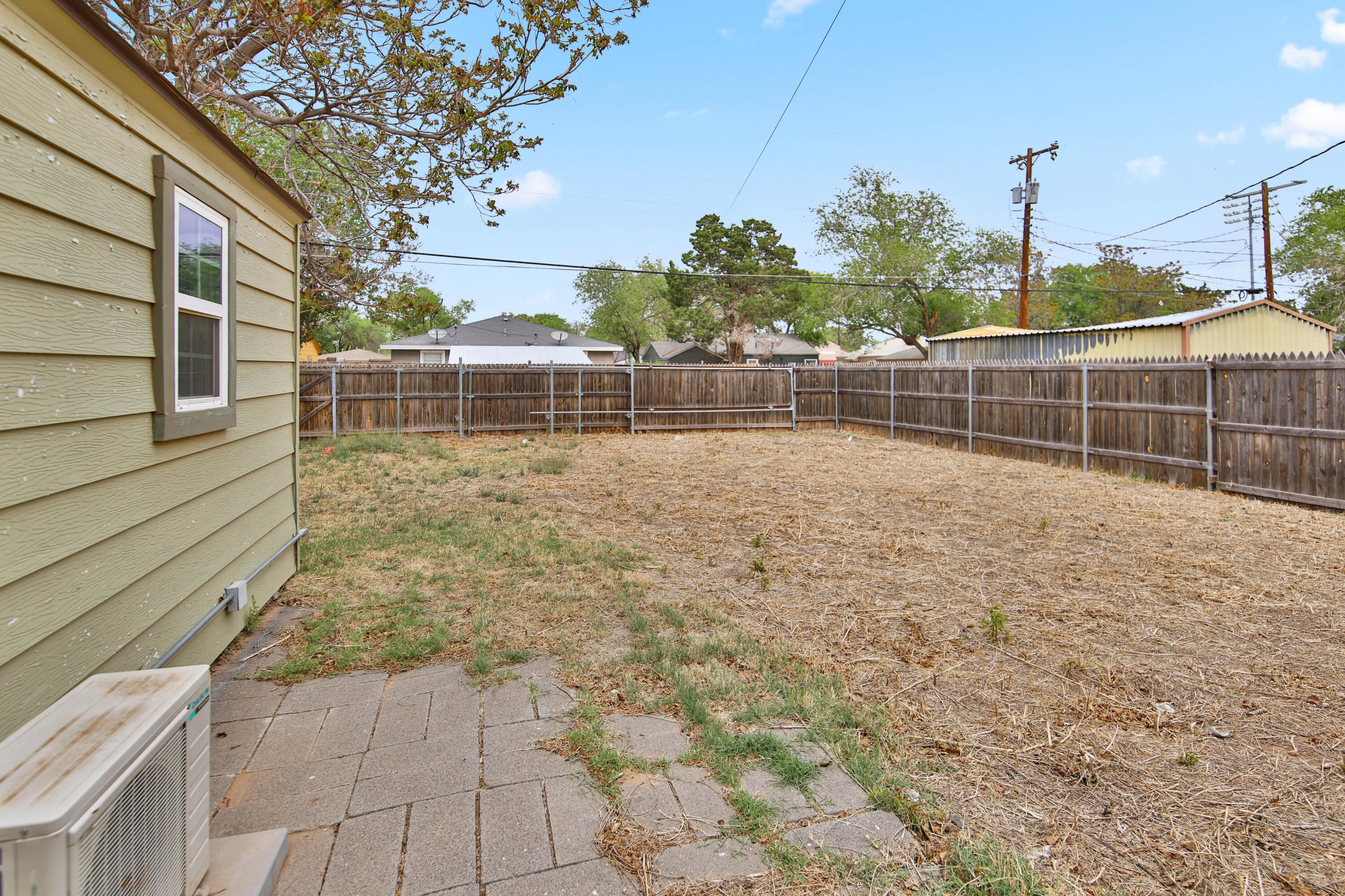 2408 24th Street Lubbock, TX 79411 - Photo 30 of 32 a view of a backyard