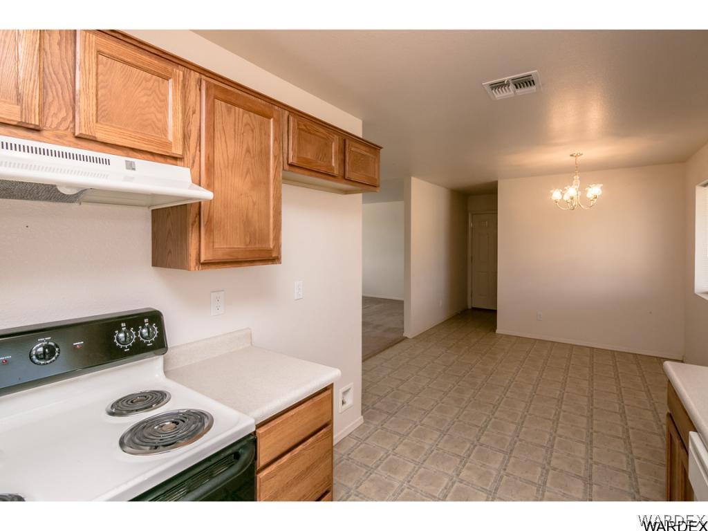 3620 Bosque Road Golden Valley, AZ 86413 - Photo 23 of 35 a view of kitchen with furniture and cabinets