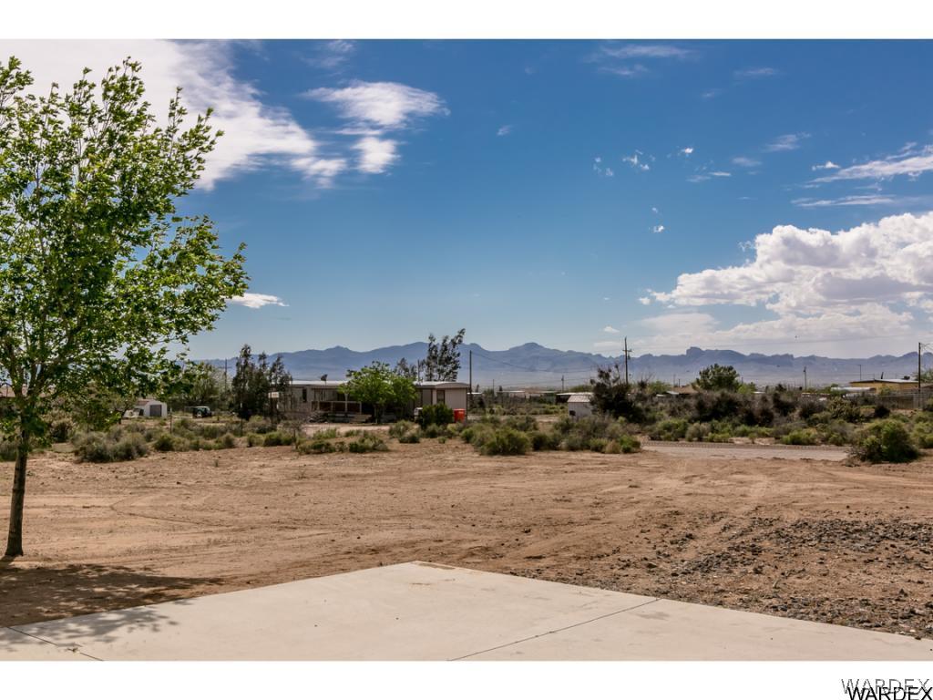 3620 Bosque Road Golden Valley, AZ 86413 - Photo 34 of 35 a view of a town with palm trees