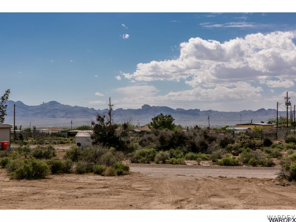 3620 Bosque Road Golden Valley, AZ 86413 - Photo 35 of 35 a view of a city with sunset