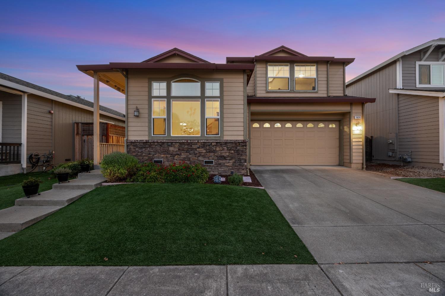 7825 Carano Way Windsor, CA 95492 - Photo 1 of 1 a front view of a house with garden