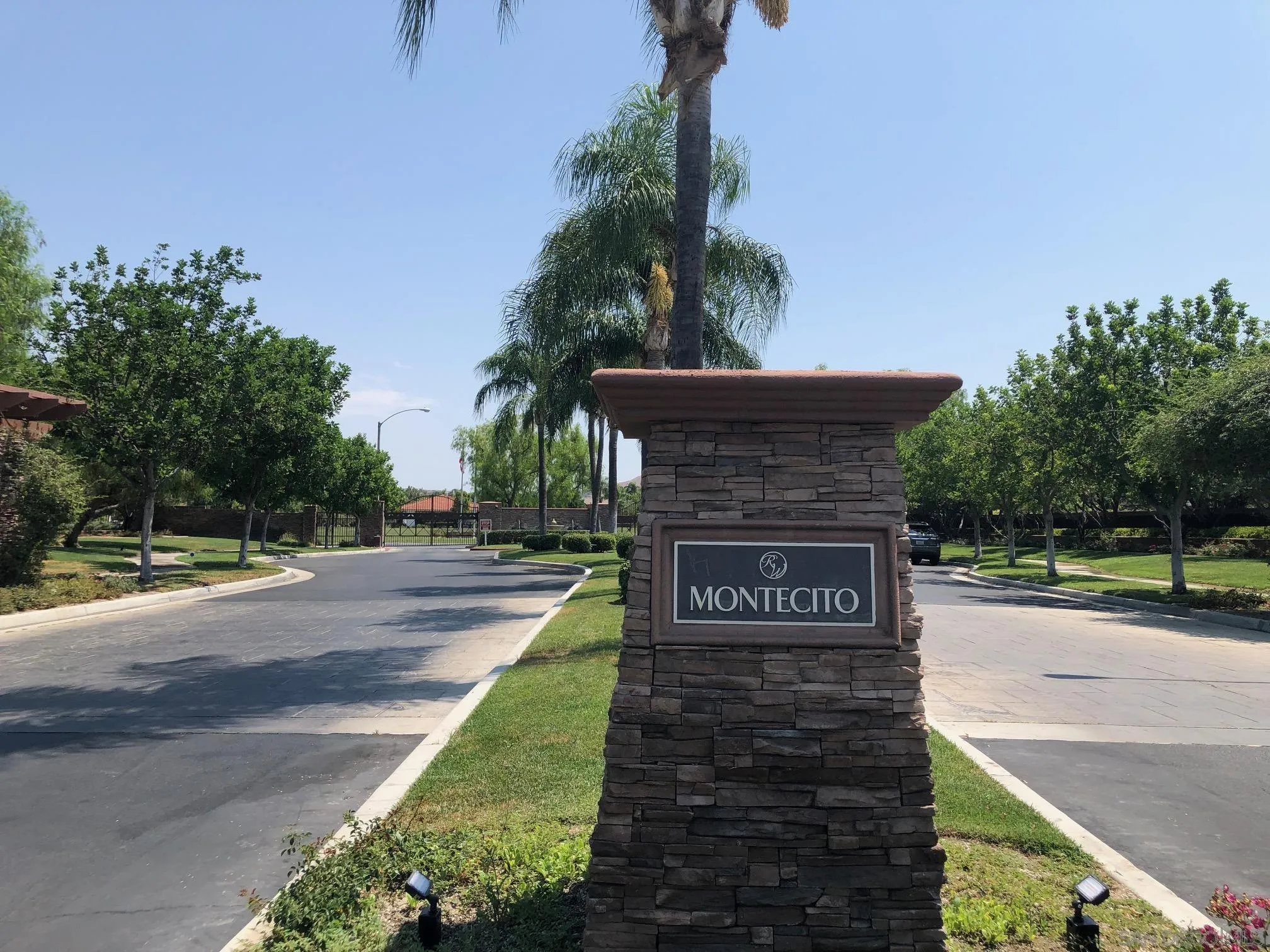 11583 Waterwell Court Riverside, CA 92505 - Photo 8 of 9 a sign that is sitting on the side of a road