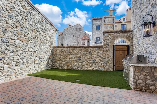 a view of front door of house with yard