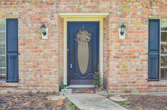 a front view of a house with an entrance