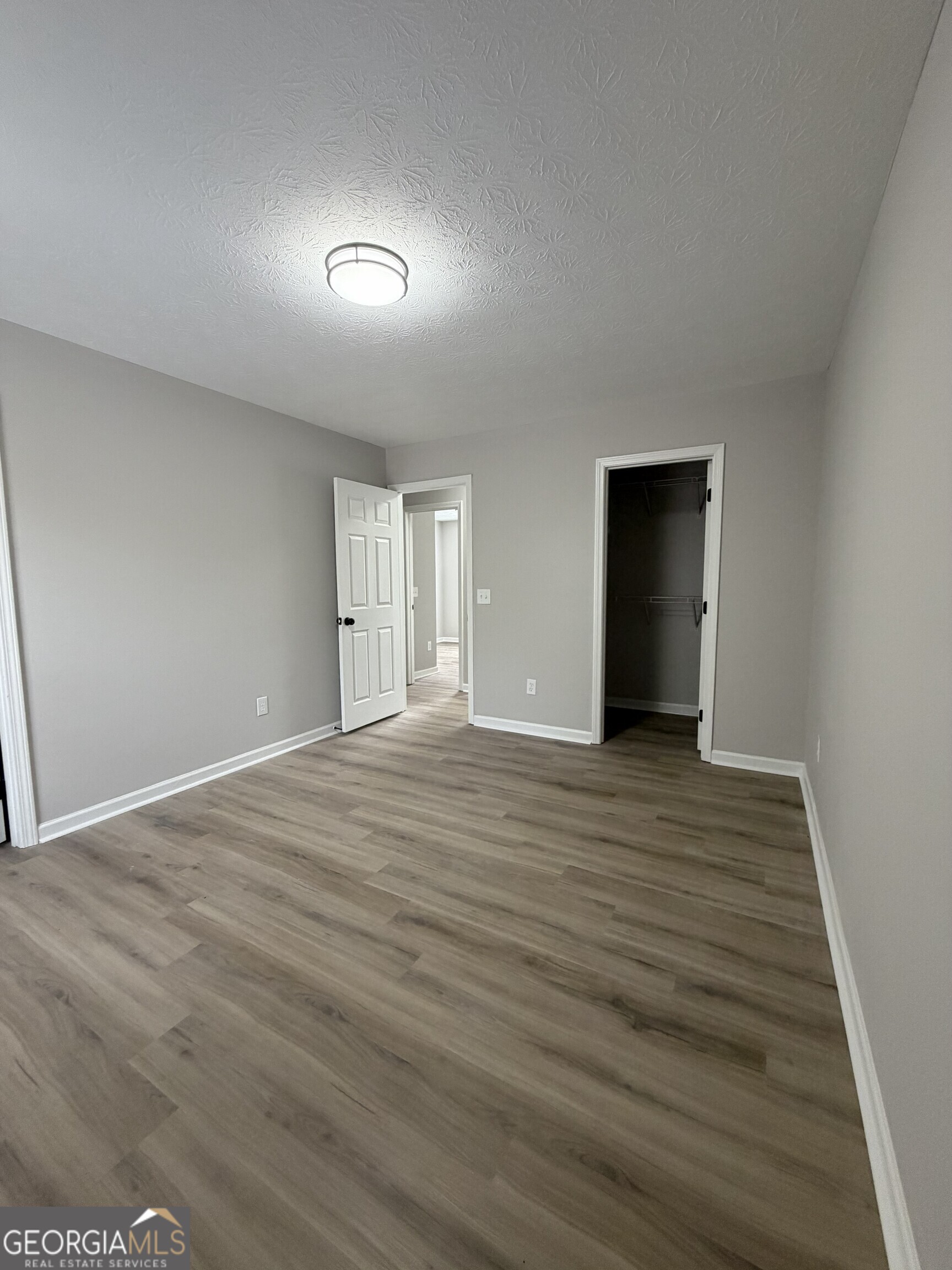 5773 Marlette Court Columbus, GA 31907 - Photo 15 of 21 a view of empty room with wooden floor