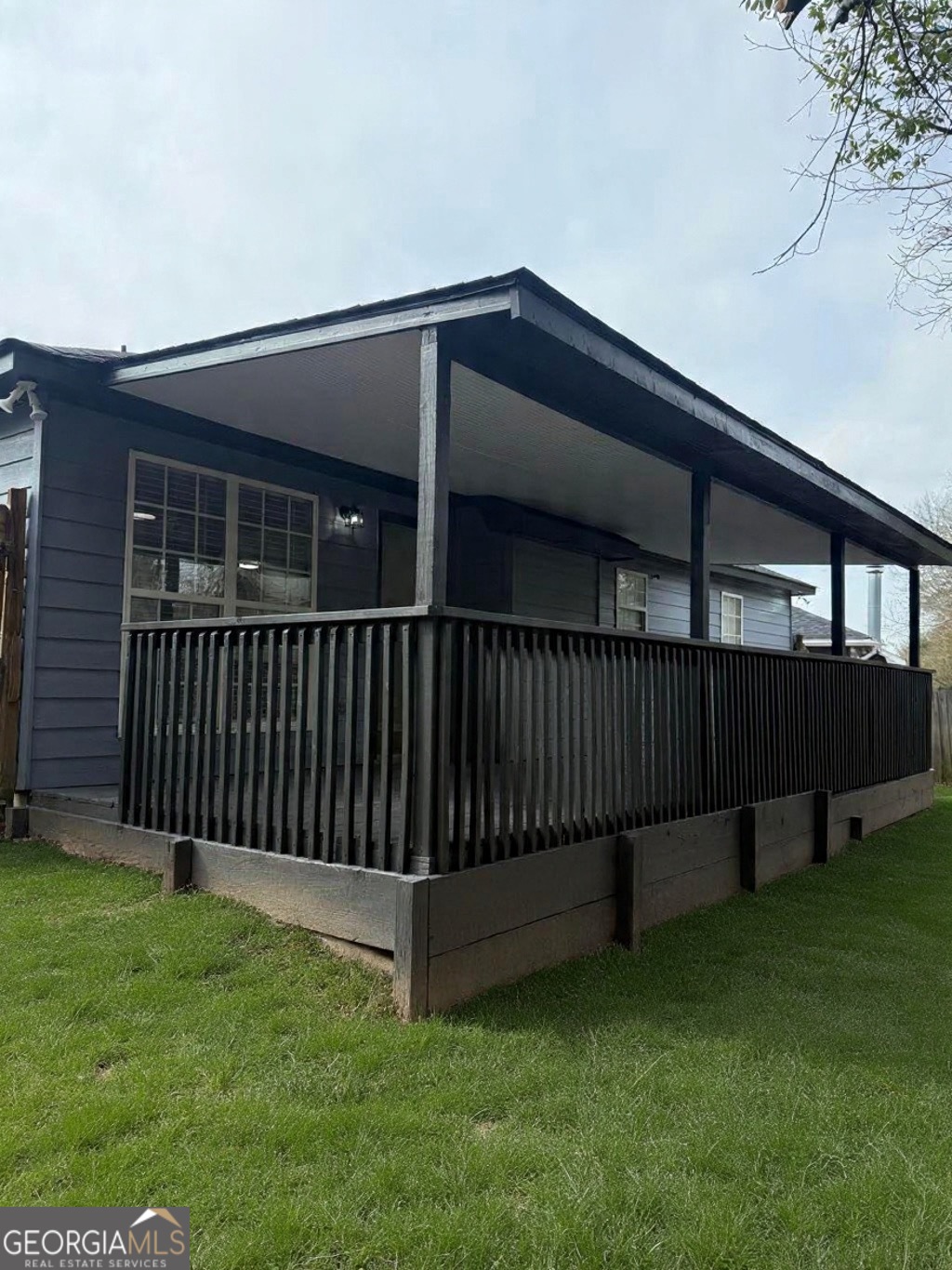 5773 Marlette Court Columbus, GA 31907 - Photo 19 of 21 a view of backyard with deck and garden