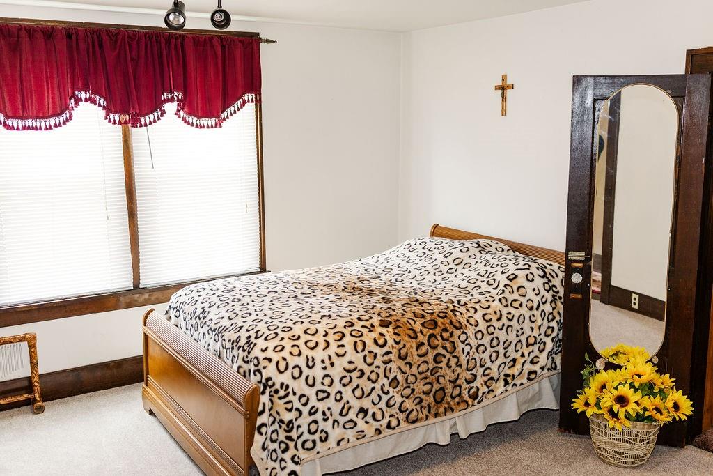 1898 Schellsburg Road Claysburg, PA 16625 - Photo 27 of 50 a bedroom with a bed and a dresser