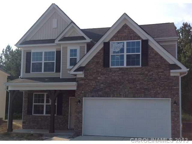 78110 Rillstone Drive Lancaster, SC 29720 - Photo 1 of 10 a front view of a house with a yard