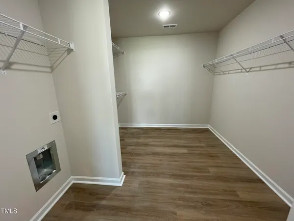 a view of room with walk in closet