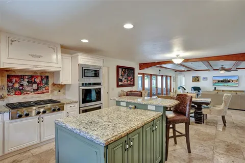 a view of a hallway with washer and dryer