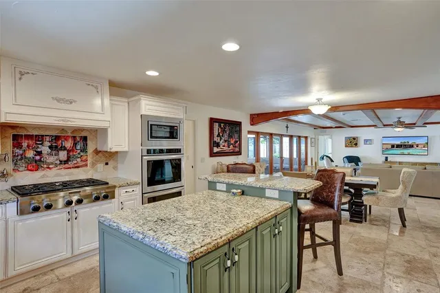 a view of a hallway with washer and dryer