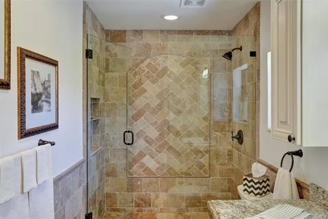 a house view with a sitting space fire pit and outdoor space