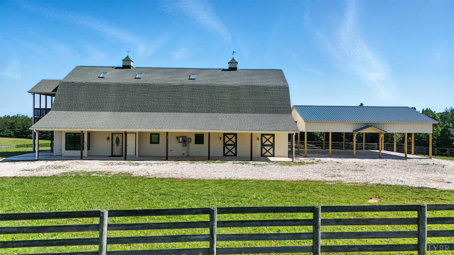 1433 Piney Mountain Road Appomattox, VA 24522 - Photo 11 of 68 a front view of a house with a yard