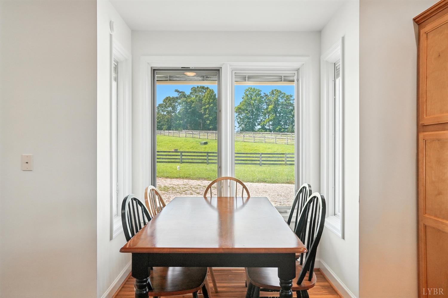 1433 Piney Mountain Road Appomattox, VA 24522 - Photo 22 of 68 a view of a dining room with furniture window and outside view