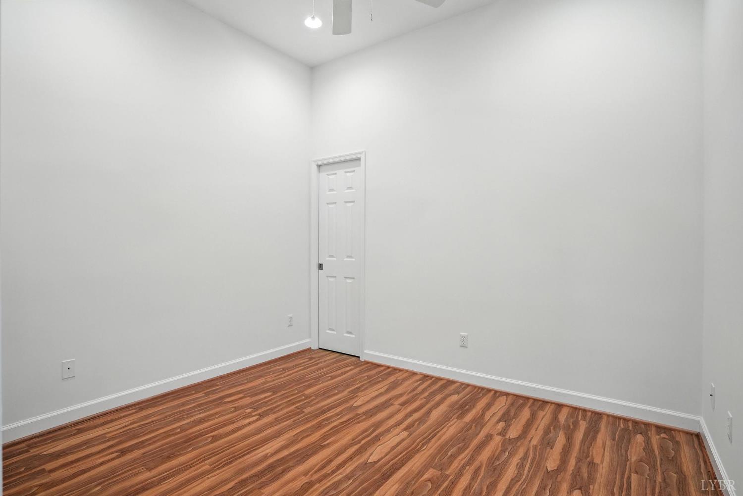 1433 Piney Mountain Road Appomattox, VA 24522 - Photo 24 of 68 a view of a room with wooden floor