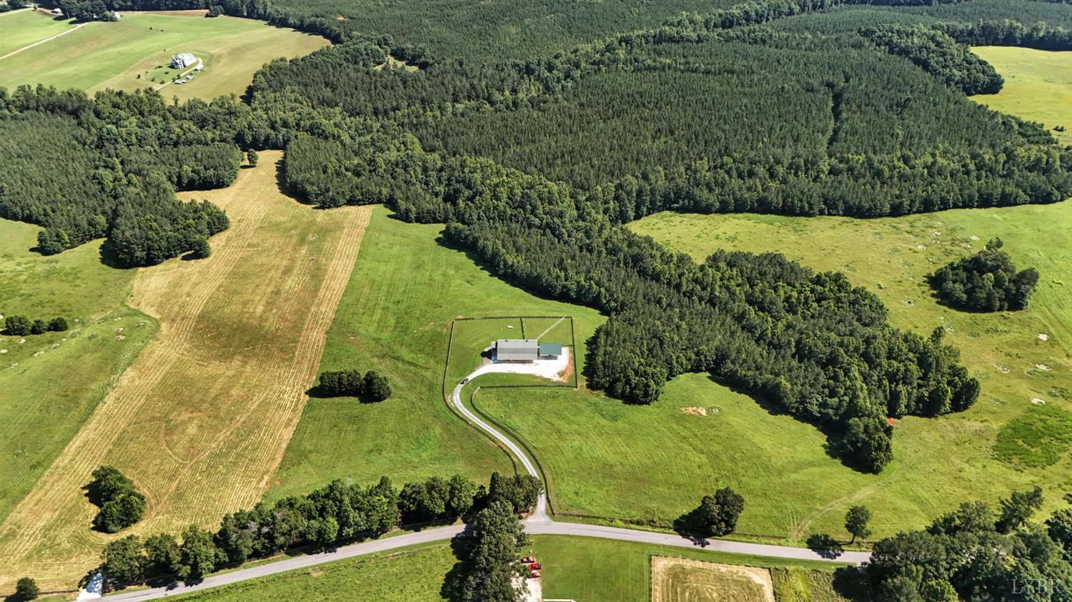 1433 Piney Mountain Road Appomattox, VA 24522 - Photo 63 of 68 a view of a swimming pool with a yard