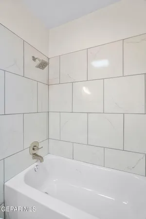 a bathroom with a bathtub