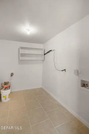 a view of a backyard with a large tree