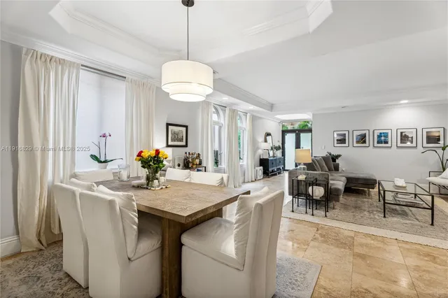 a view of a dining room and livingroom view kitchen