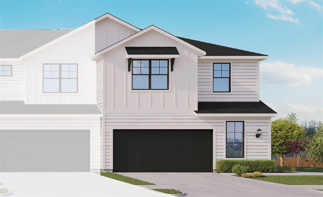 180 C Waterside Road Buda, TX 78610 - Photo 1 of 1 a front view of a house with yard