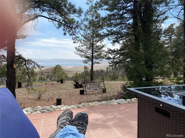 a outdoor space with lots of tables and chairs