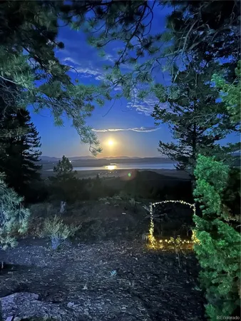 a living room with furniture fireplace and flat screen tv