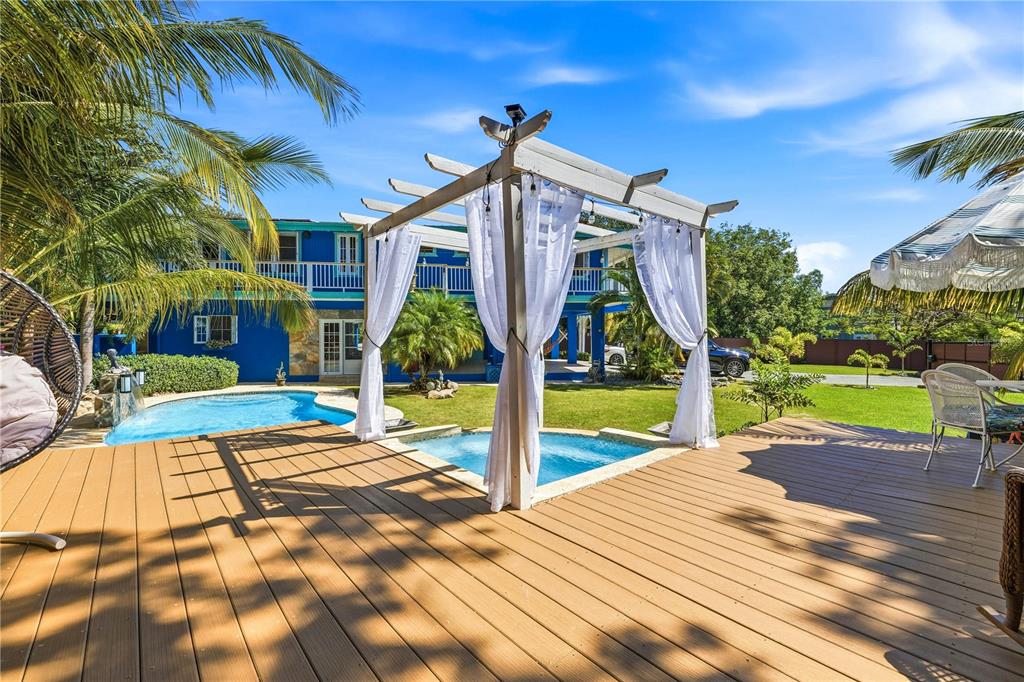 1 Gil Bouyet Street Cabo Rojo, PR 00623 - Photo 3 of 24 a view of a house with a swimming pool