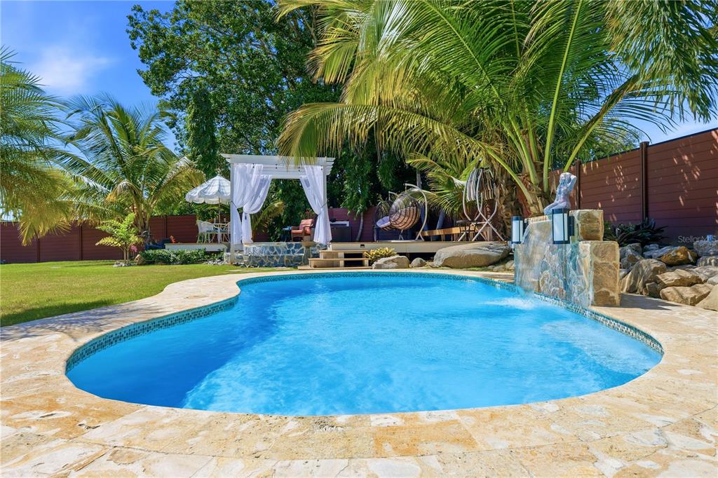 1 Gil Bouyet Street Cabo Rojo, PR 00623 - Photo 4 of 24 a view of a swimming pool with sitting area