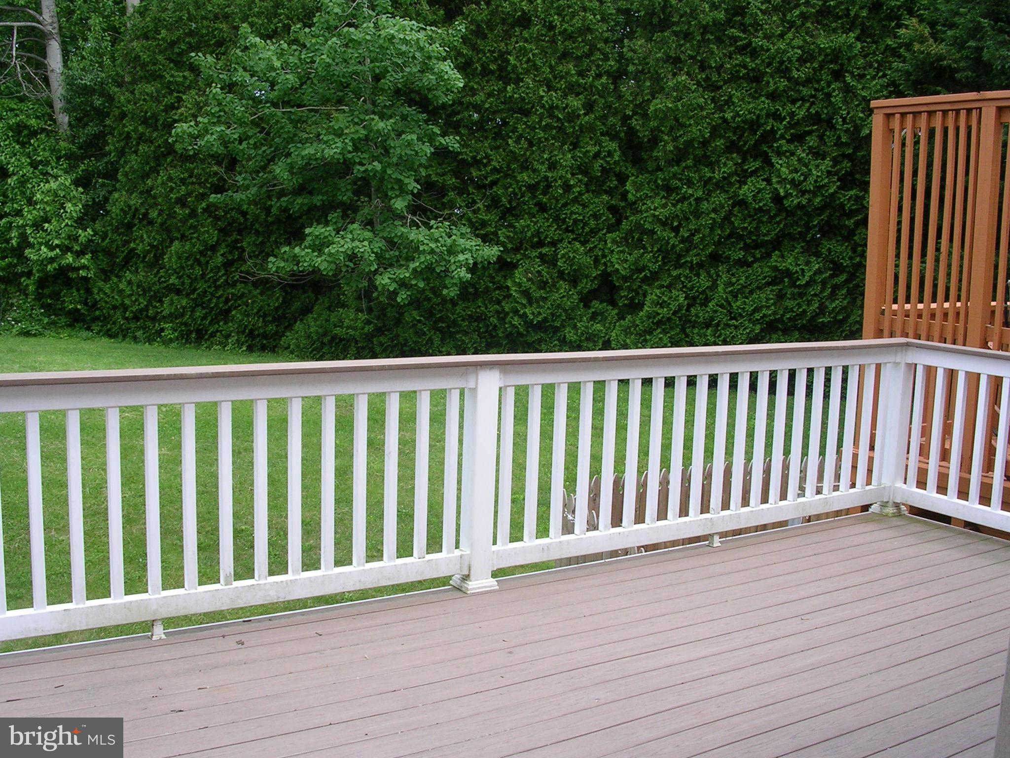 32 Bellhurst Way Nottingham, MD 21236 - Photo 13 of 28 kitchen leads to beautiful composite deck