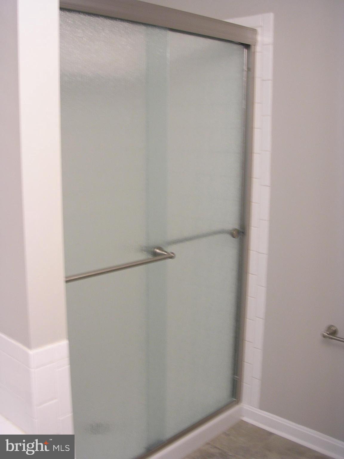 32 Bellhurst Way Nottingham, MD 21236 - Photo 18 of 28 Upper bath remodeled shower with new door