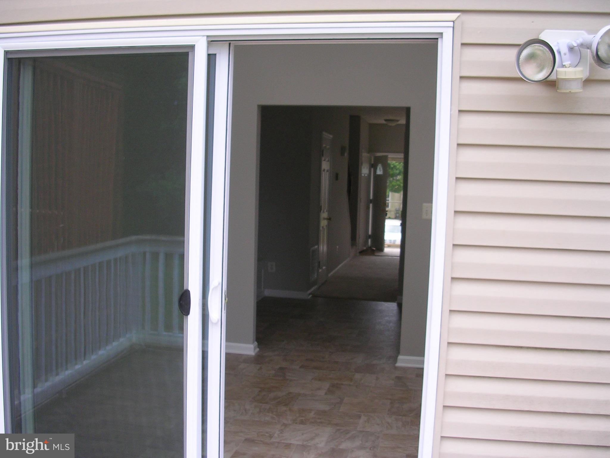32 Bellhurst Way Nottingham, MD 21236 - Photo 26 of 28 Sliders from sunroom to deck