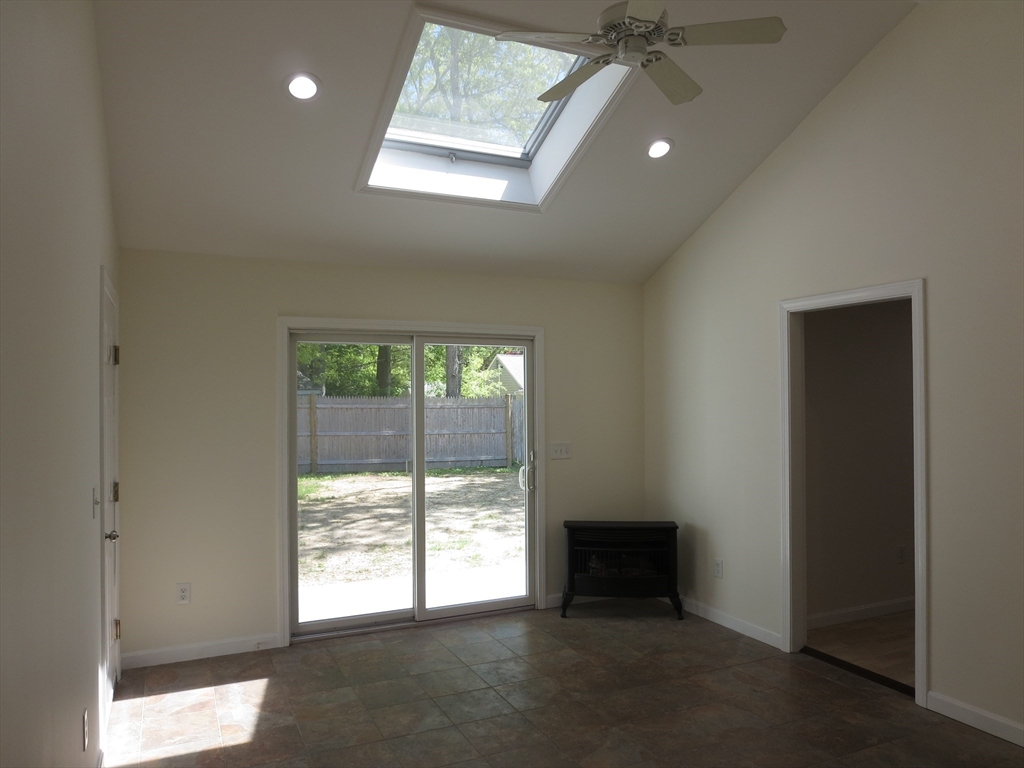 130 Fuller Road Barnstable, MA 02632 - Photo 4 of 14 a view of an empty room with a window