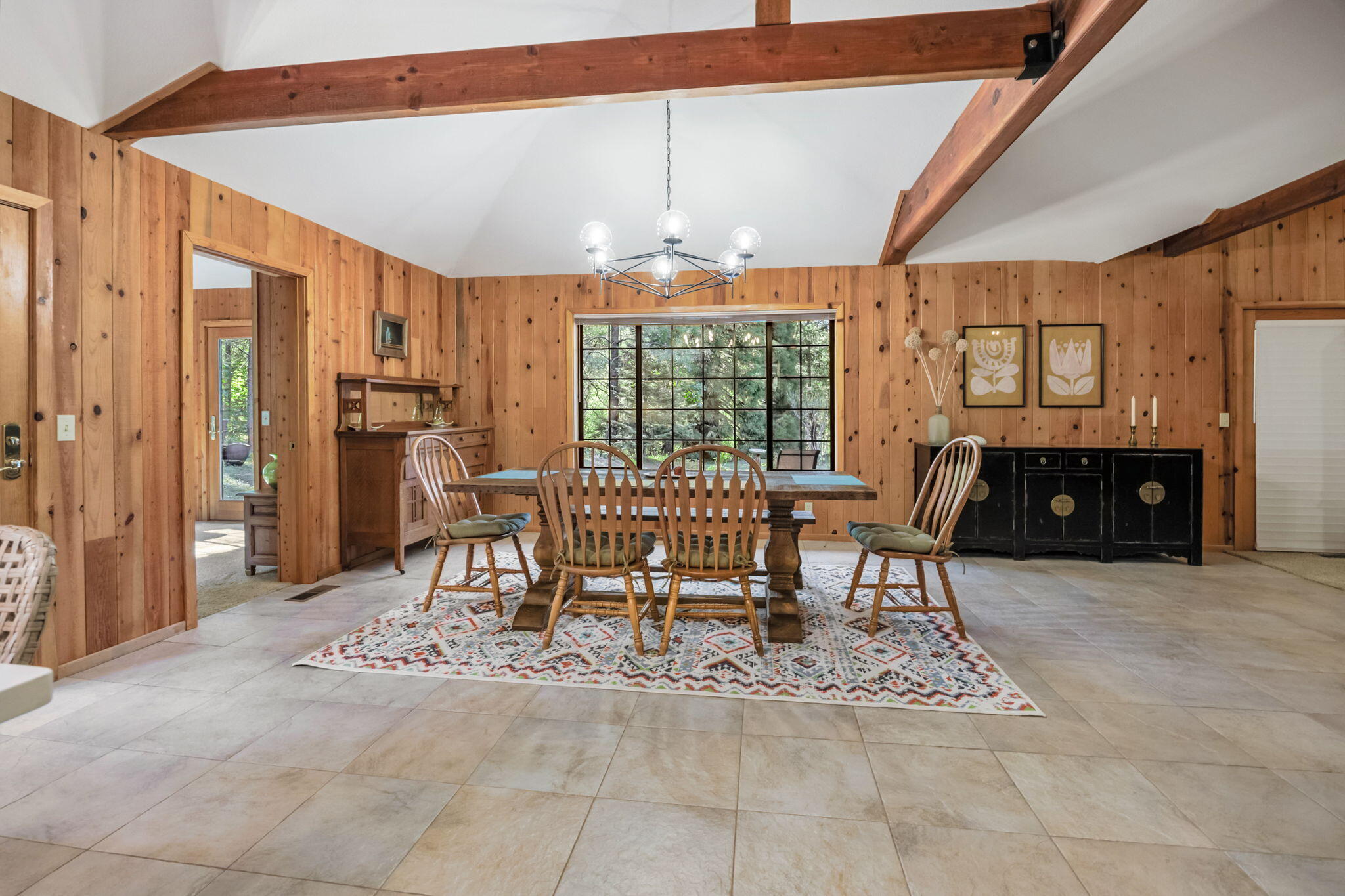 120 Lomas Road Jacksonville, OR 97530 - Photo 16 of 62 a dining room with furniture and a floor to ceiling window