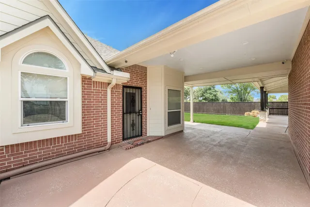 a view of a house with a garden