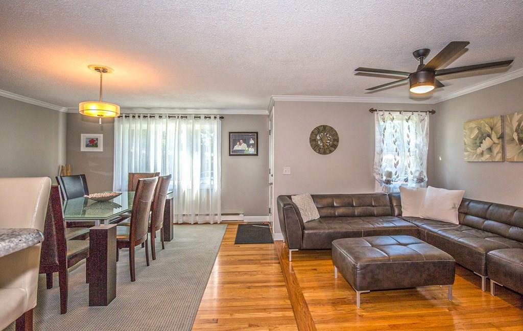44 Quentin Road Springfield, MA 01129 - Photo 12 of 40 a living room with furniture and a lamp