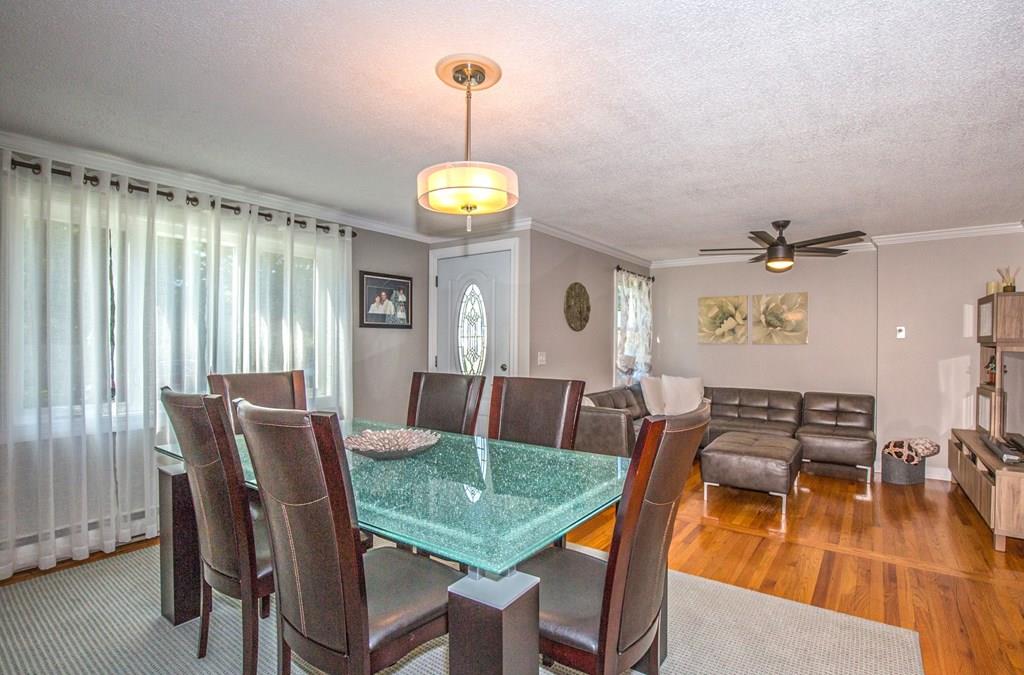 44 Quentin Road Springfield, MA 01129 - Photo 13 of 40 a view of a dining room with furniture window and wooden floor