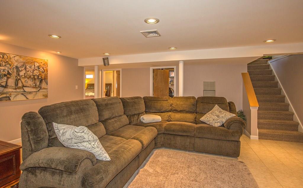 44 Quentin Road Springfield, MA 01129 - Photo 22 of 40 a living room with furniture and kitchen view