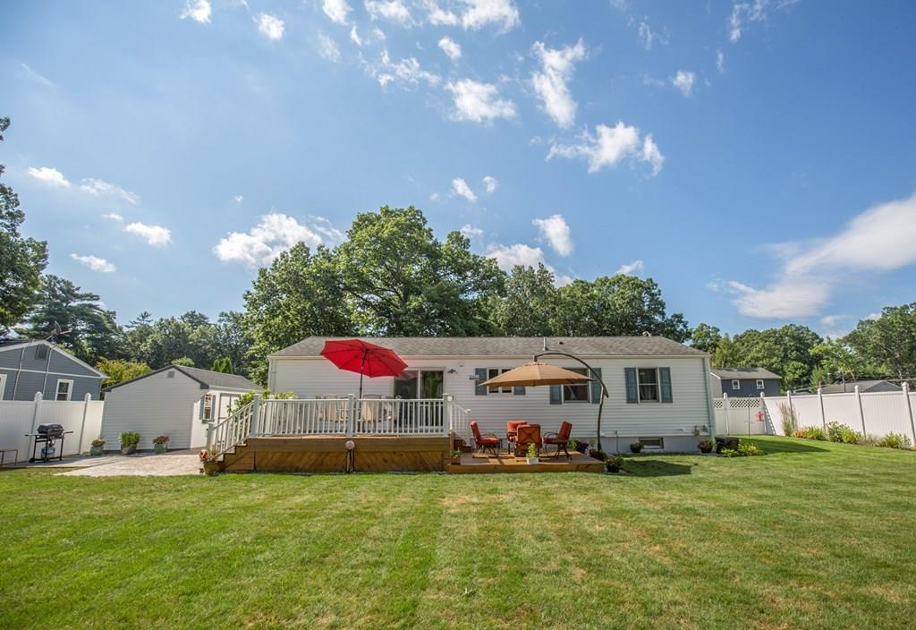 44 Quentin Road Springfield, MA 01129 - Photo 33 of 40 a view of a house with a backyard and a tree