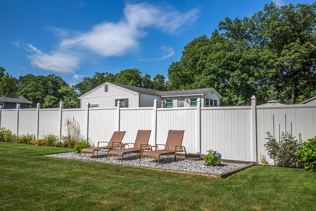 44 Quentin Road Springfield, MA 01129 - Photo 34 of 40 a view of house with backyard and sitting area