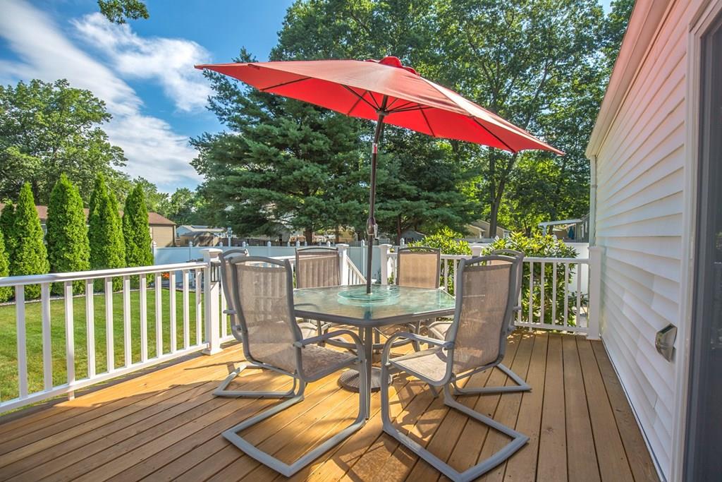 44 Quentin Road Springfield, MA 01129 - Photo 38 of 40 a view of balcony with wooden floor and outdoor seating