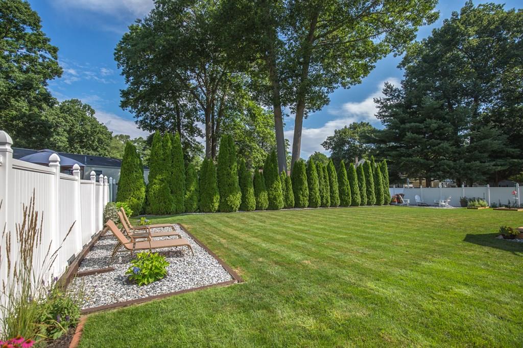 44 Quentin Road Springfield, MA 01129 - Photo 40 of 40 a backyard of a house with lots of green space