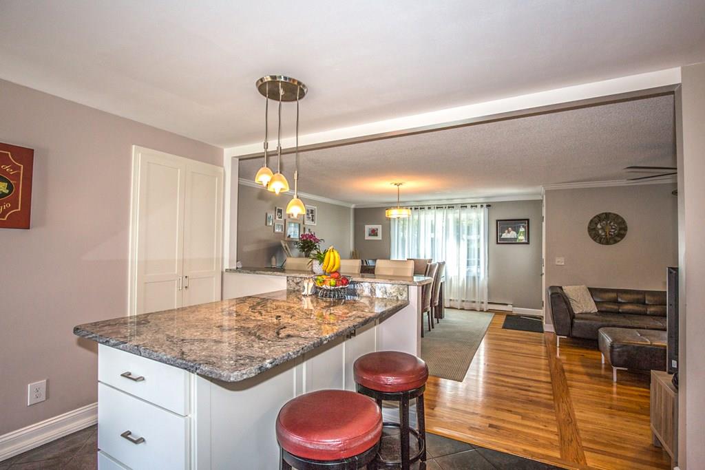 44 Quentin Road Springfield, MA 01129 - Photo 9 of 40 a living room with dining table and wooden floor