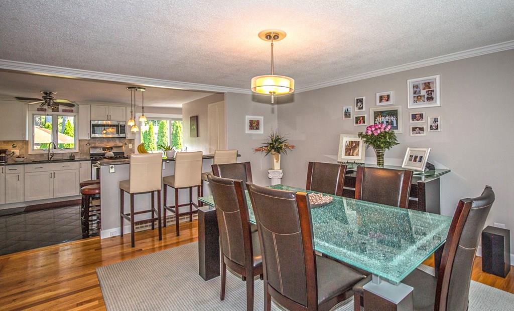 44 Quentin Road Springfield, MA 01129 - Photo 10 of 40 a view of a dining room with furniture window and wooden floor