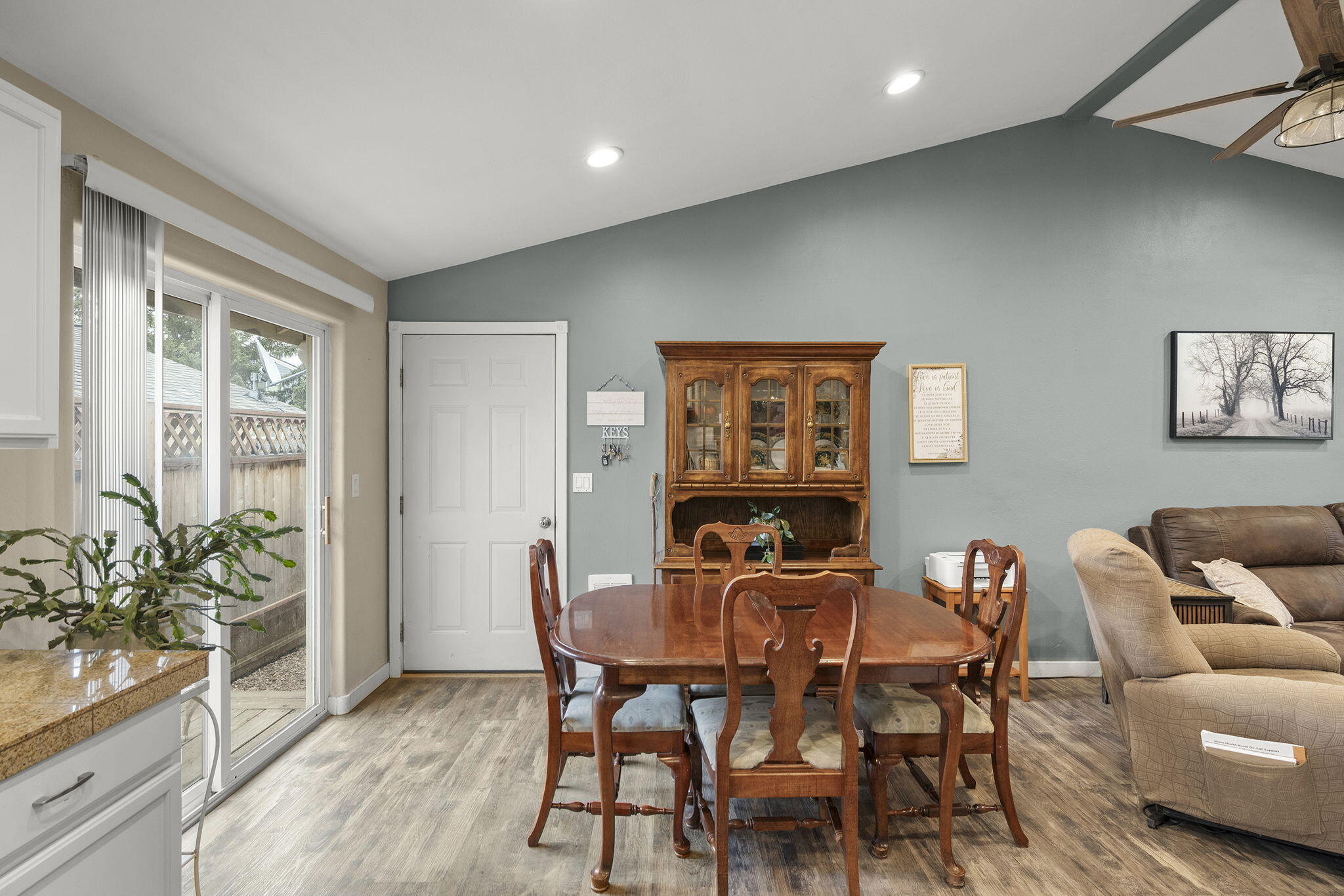 552 Southwest Lincoln Street Madras, OR 97741 - Photo 7 of 23 a dining room with furniture and wooden floor
