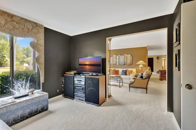 a living room with furniture and a couch