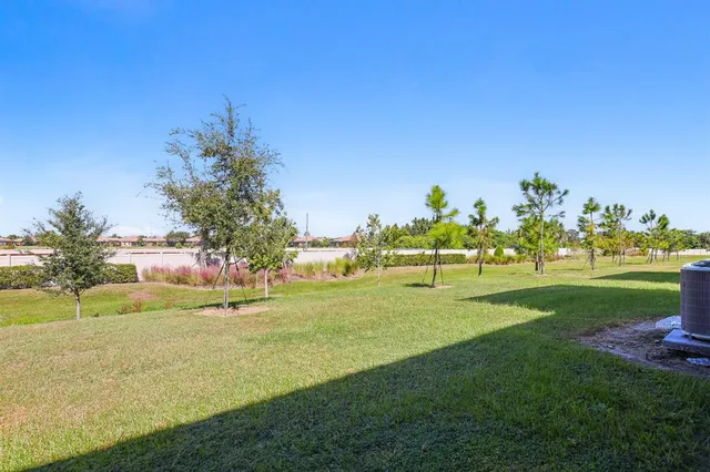 a view of a golf course with a lake
