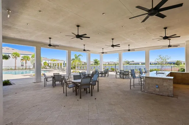a view of a patio with swimming pool