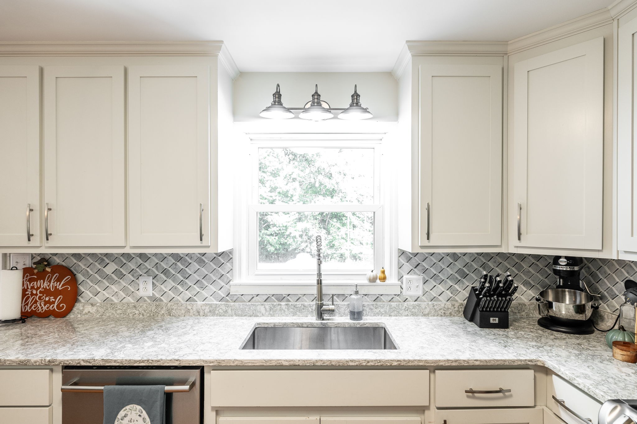 2714 Morgan Road Joelton, TN 37080 - Photo 17 of 78 a kitchen with granite countertop a sink and a white wooden cabinets
