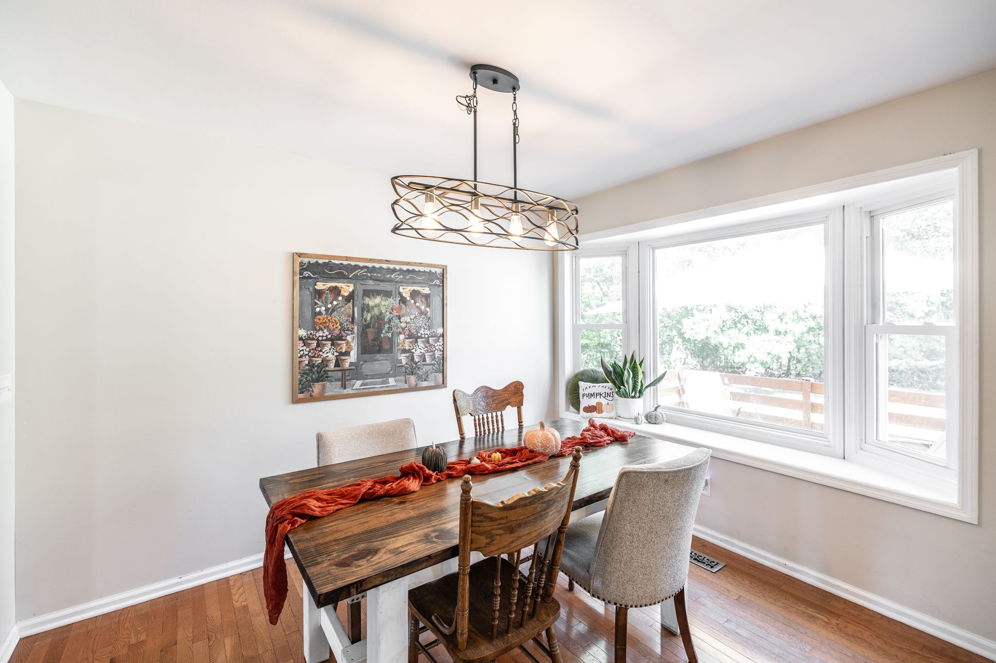 2714 Morgan Road Joelton, TN 37080 - Photo 23 of 78 a dining room with furniture a chandelier and wooden floor
